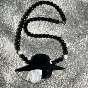 Vintage pearl lady head necklace.